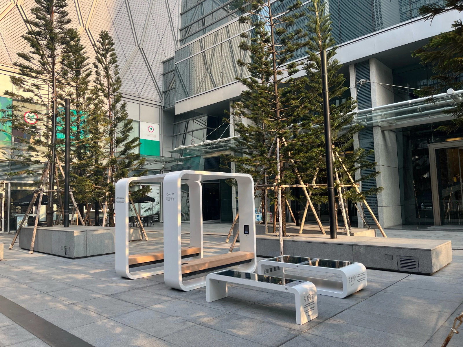 Smart Hub, Eco and Nano smart street furniture installed in a modern urban plaza in Bangkok, Thailand.